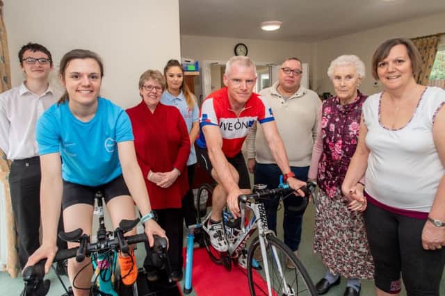 Young and old involved in the charity cycle ride at St Andrew's Care Home, Ewerby. EMN-190804-105559001