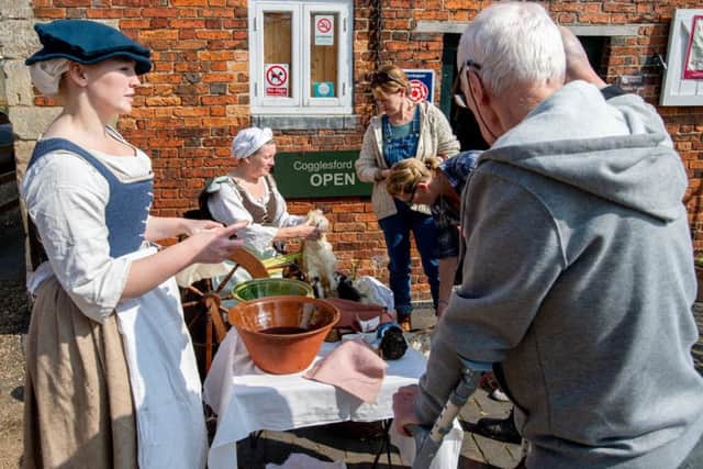 Georgia Ratcliffe showing Tudor dyeing methods EMN-190804-134900001