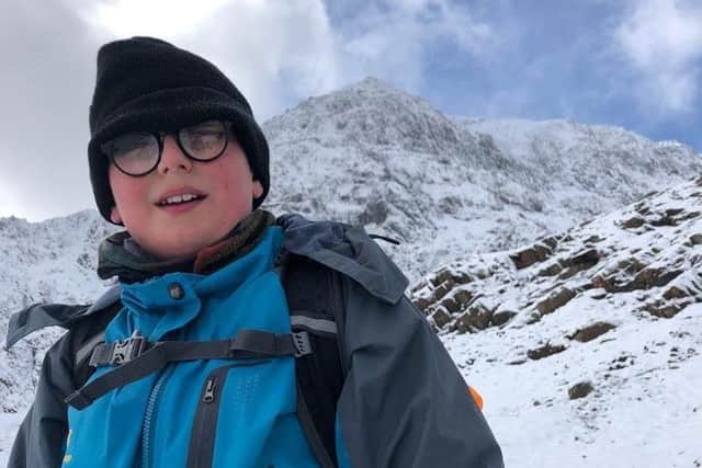 Ethan Bain on his Snowdon challenge. EMN-190904-094254001