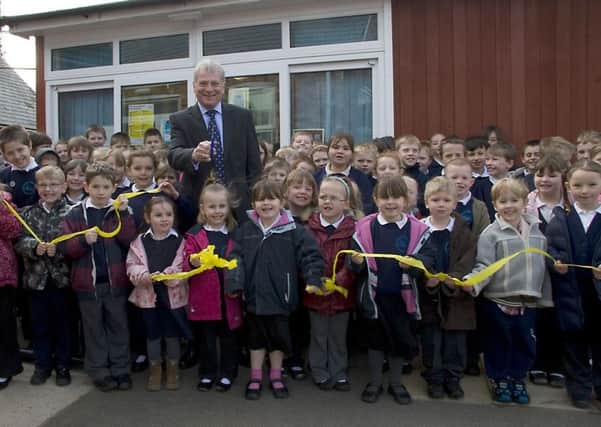 Canon Peter Staves, director of education at the diocese of Lincoln, at Halton Holegate Primary School 10 years ago.