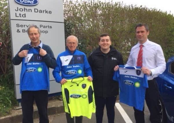 From left, Colin Darke (business owner), Keith Snape (Matthew Manseys grandfather and Darkes customer), Matthew Mansey (Louth Town coach), Paul Wooding (Darkes. sales director) with home kit, goalkeeper top and training jumper EMN-190804-124715002