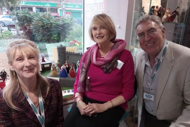 Jacqui Cleaver - Sleaford Museum Curator, Mark Bamford - chairman and Jan Spooner - vice-chairman with the new dolls display. EMN-190904-131712001
