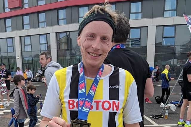 Dan Clark was the first Boston Community Runner home in Manchester. 9Kg5MK-NQvYA6WMPA_NL