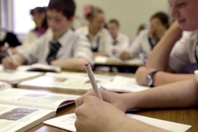A stock image of school pupils taking exams