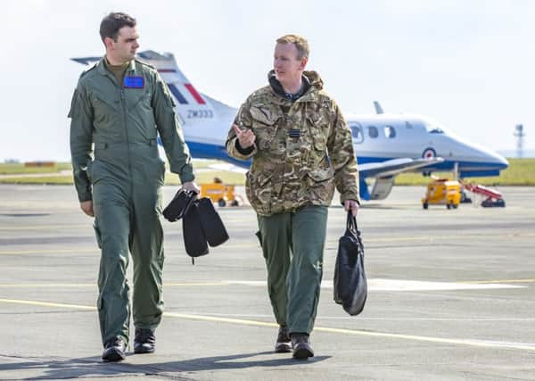 Instructor Sqn Ldr Ian Birchall and Flying Officer Jake Weeks after the first training sortie in one of RAF College Cranwell's new Phenom ZM333 aircraft used by 45 Sqn. Photo: Gordon Elias EMN-191104-175610001