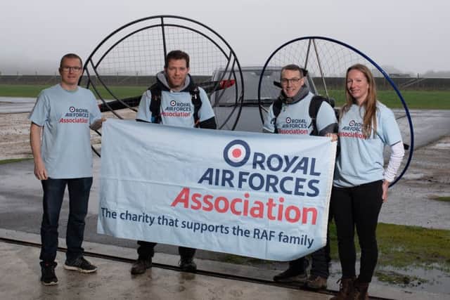 From left - paramotorists Paul Mockford and Flight Lieutenant Giles Fowler with their support crew Andy Greaves and Katie Pagett. EMN-191104-165511001