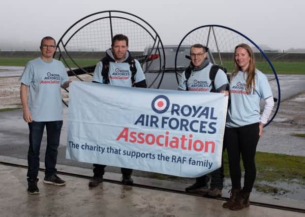 From left - paramotorists Paul Mockford and Flight Lieutenant Giles Fowler with their support crew Andy Greaves and Katie Pagett. EMN-191104-165511001