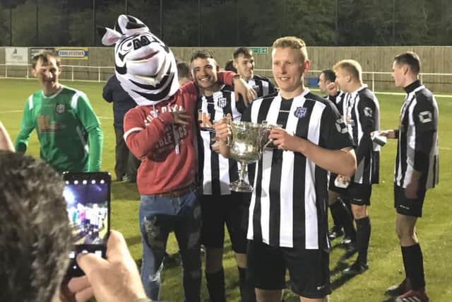 Brigg celebrate.