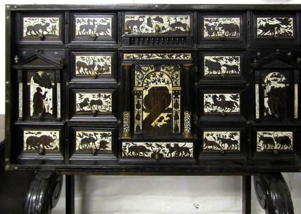 The 18th century Italian cabinet which made the top price and (inset) the Chinese pot pourri  jar
