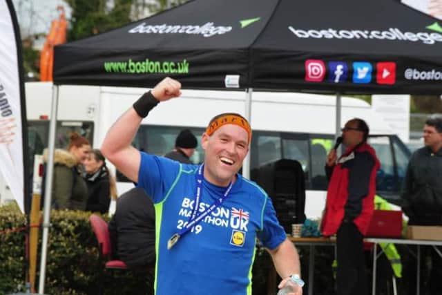 Martin Chapman punches the air in celebration of a Boston marathon PB. rlg5EAVhP4G5aJMTIuTo