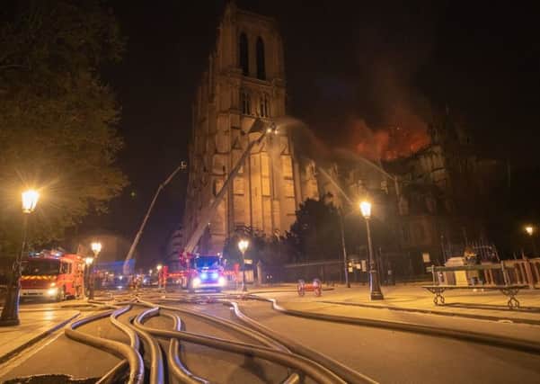 French firefighters at the scene of Monday's fire at Notre Dame cathedral in Paris. Photo: Benoit Moser / Pompiers de Paris/PA Wire . EMN-190417-155501001