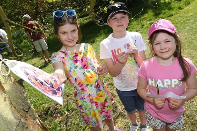 Easter egg hunt at Rauceby Hall with visits to the lambing sheds at Rauceby Hall Farm. L-R Lottie Ireland 8, Davey Drozd 9 and Lyra Drozd 6. EMN-190422-095331001