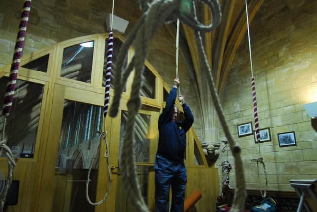 Richard Spencer ringing the tenor bell at St Denys' Church, Sleaford on Thursday in support of Notre Dame Cathedral after its devastating fire.
