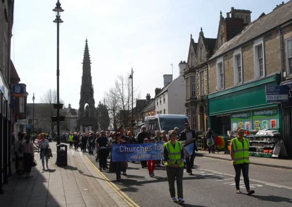The Good Friday Walk of Witness through Sleaford to the Market Place. EMN-190422-145121001