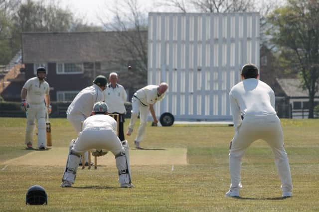 Sean Wooley opens Caistor's defence of their Premier title, bowling from the Kelsey Road End. Picture: Wes Allison EMN-190423-100859002