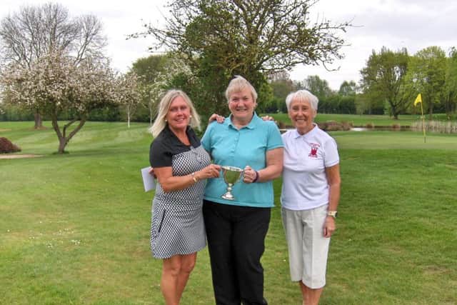 Hilary Calvert and Jenny Gleeson with Lady Captain Pam Clare.