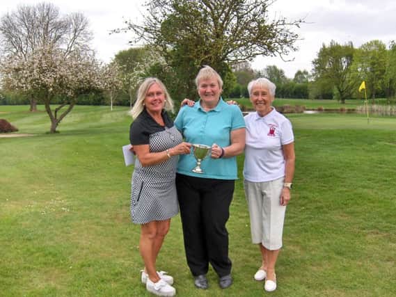 Hilary Calvert and Jenny Gleeson with Lady Captain Pam Clare.
