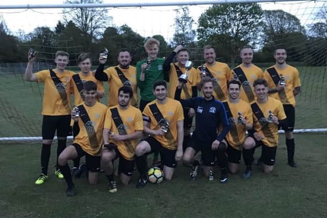Eagle United celebrate.
