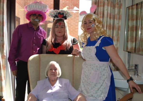 Eveline Annabel is pictured with staff at Toray Pines, in Coningsby, to celebrate her 104th birthday.