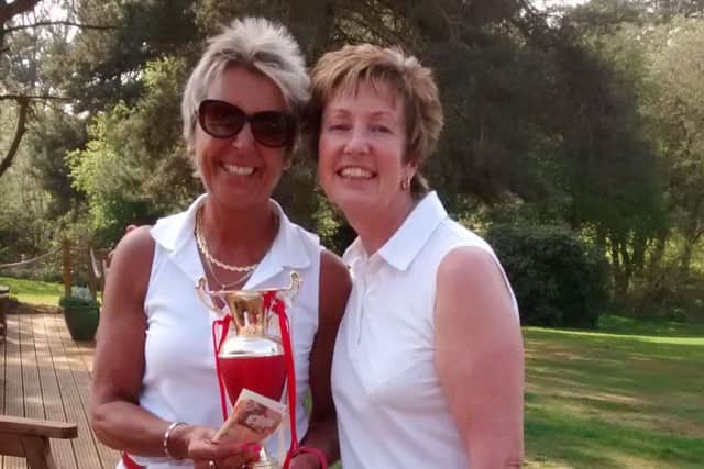 Ladies' Captain Mel Gregory presents the St George's Fantasy prize to Lulu Wood.