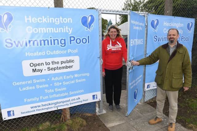 Heckington swimming pool gala open day after major refurbishment. Sarah O'Brien and Alan Mellett at the new entrance. EMN-190605-104008001