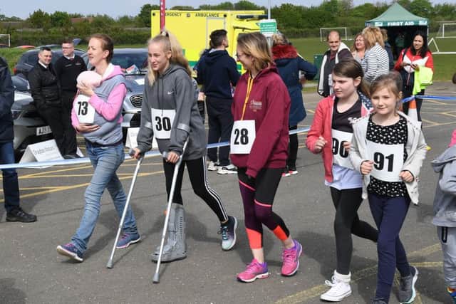 Sleaford Half Marathon and Fun Run. Start of the fun run. EMN-190605-103856001
