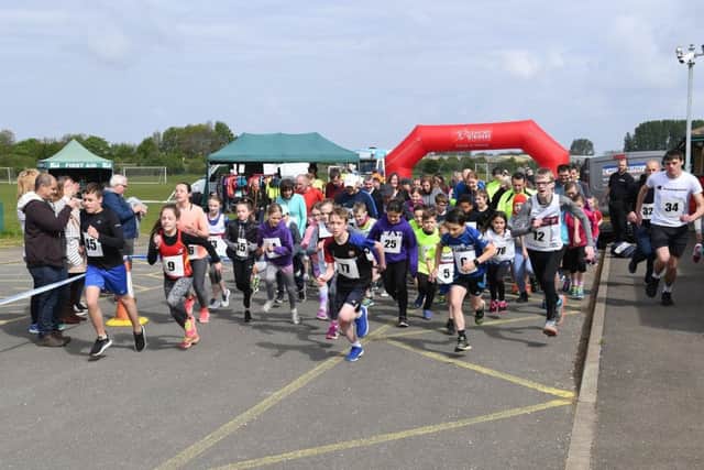 Sleaford Half Marathon and Fun Run. Start of the fun run. EMN-190605-103822001