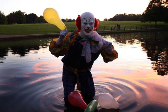 The killer clown craze hit the UK six years ago when a man dressed as a clown started scaring people in a Northampton park, mimicking the Stephen King film, It. Northampton Clown at Abington Park Lake. ENGNNL00120130922202227