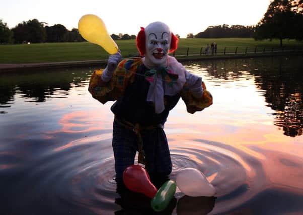 The killer clown craze hit the UK six years ago when a man dressed as a clown started scaring people in a Northampton park, mimicking the Stephen King film, It. Northampton Clown at Abington Park Lake. ENGNNL00120130922202227