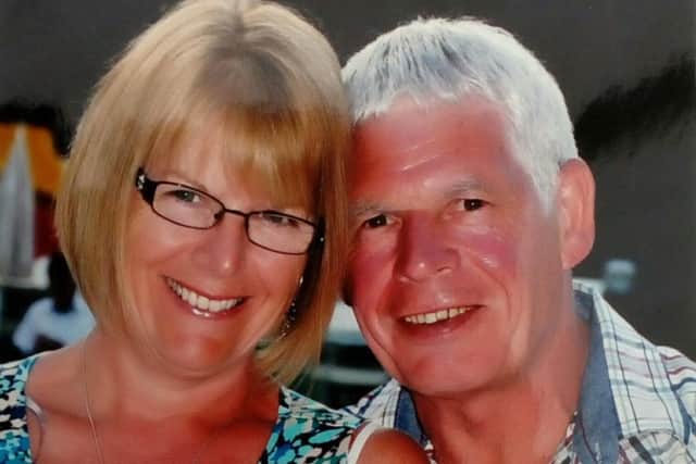 Kim Hopper with her husband, Chris.