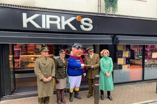 Kirk's Butchers in Skegness handing over the wartime recipe sausages they have made for the 1940's event at The Village Church Farm in Skegness this weekend. The Jolly Fisherman also popped along to give them the thumbs up. ANL-190513-073914001