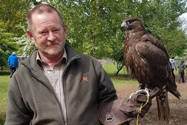 Trevor Roberts enjoyed a falconry experience at Tattershall Farm Park after finding missing Gyr Saker Falcon Delta (right). EMN-190514-092618001