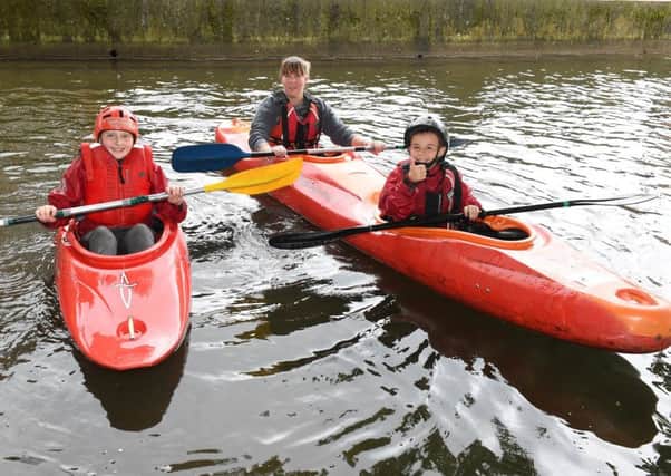 Slea Paddlers Canoe and Kyak Club holding taster sessions on the Slea. L-R Charlie Wetherill 11, Shannon Price and Tyrone Andrew 8 EMN-190520-111815001