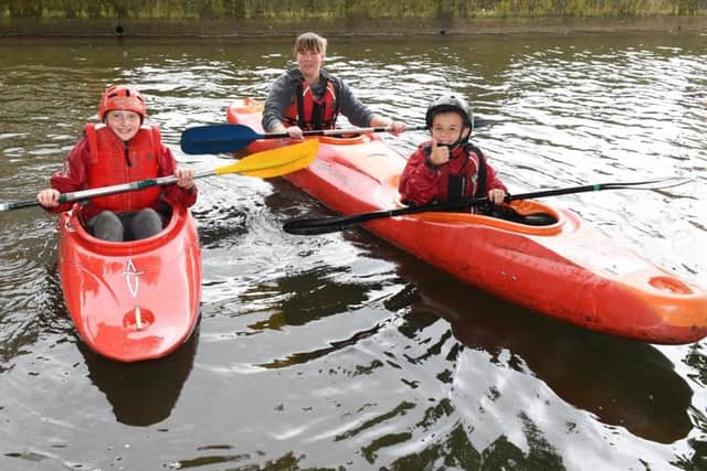 Slea Paddlers Canoe and Kyak Club holding taster sessions on the Slea. L-R Charlie Wetherill 11, Shannon Price and Tyrone Andrew 8 EMN-190520-111815001