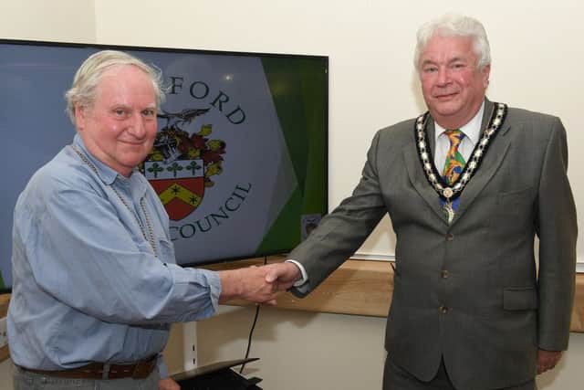 Coun Anthony Brand (left) is welcomed as new deputy mayor by new mayor Adrian Snookes. EMN-190516-132820001