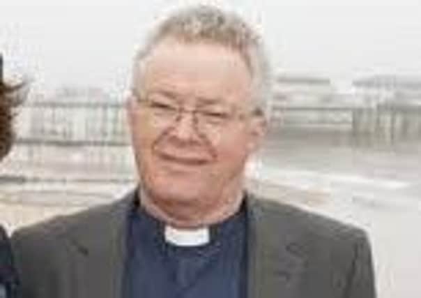 The Bishop of Grimsby, the Rt Rev David Court