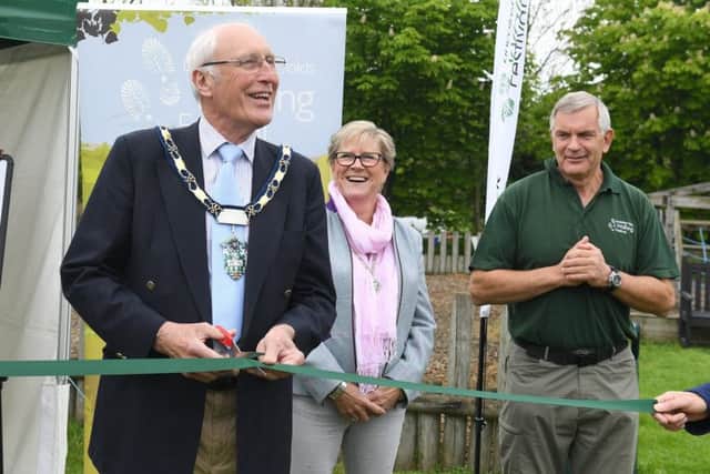 Launch of the Wolds Walking Festival. Official opeing by Councillor Neil Jones, pictured with his consort Heather Bailey EMN-190520-124703001