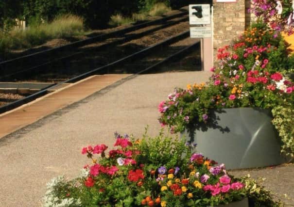 Flowers provide a pleasing welcome at Market Rasen station EMN-190521-121309001