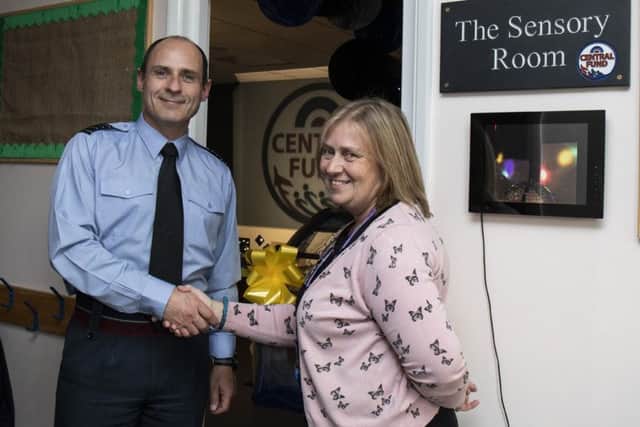 Station Commander, Group Gaptain Flewin, with Nursery and Kids Club Manager Jill Proctor.