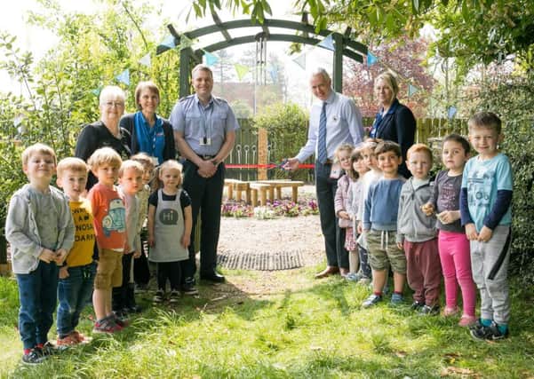 The Friendship Garden, with Wing Commander Andy Ross, Kidzons chairman of trustees, and Steven Ross, manager of Tesco, Sleaford. Picture: Linda Lowing/UK MoD Crown Copyright