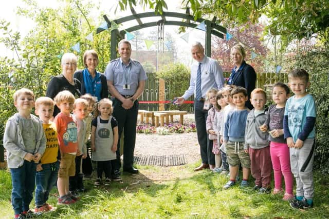 The Friendship Garden, with Wing Commander Andy Ross, Kidzons chairman of trustees, and Steven Ross, manager of Tesco, Sleaford. Picture: Linda Lowing/UK MoD Crown Copyright