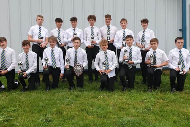 The team at the league awards evening. From left, back - Chris Allen, Obie Casson, Josh Nichols, Andrew Marriott, Luke Griffiths, Jake Christie,
Luke Bennett; front - Alex Aistrop, Callum Clark, Ellis Annibal, Philip Rands-Bett, Matty Morfitt, Josh Trushell, Charles Fox, Jack Edser EMN-190524-101807002