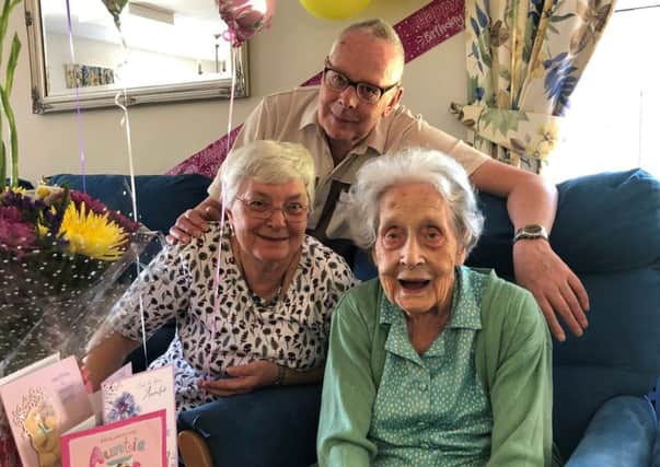 Alice Snow (right) celebrating her 102nd birthday. ANL-190524-131744001