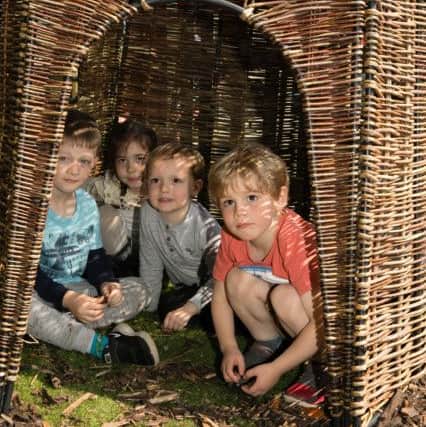 children playing in the Friendship Garden after its opening ceremony. Picture: Linda Lowing/UK MoD Crown Copyright