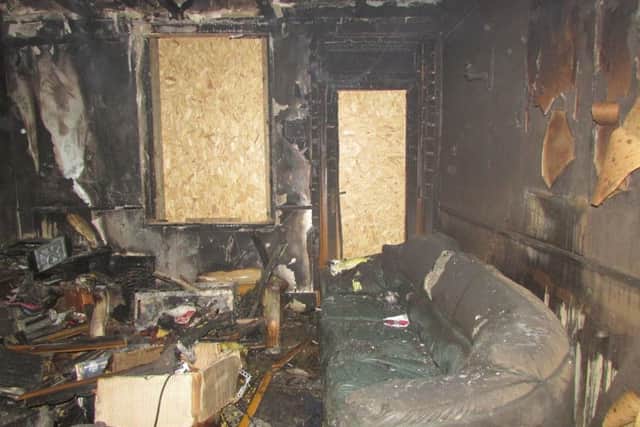 The blackened living room of Tim Sampson's home in Queen Street, Sleaford. EMN-190525-004303001