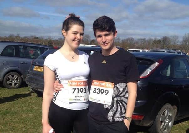 Beth and Wes in their running gear.