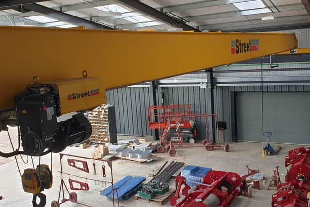 The overhead Street crane, one of the new additions to the Scotts Precision Manufacturing site near Boston.