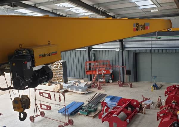 The overhead Street crane, one of the new additions to the Scotts Precision Manufacturing site near Boston.
