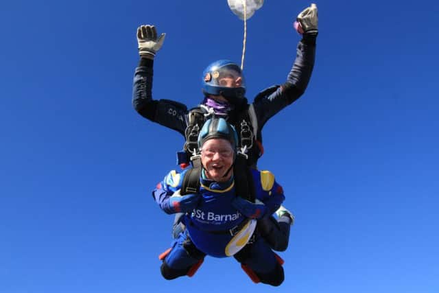 Sheila Robinson mid-air at last year's skydive EMN-190530-143741001