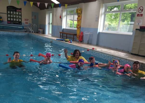 Youngsters enjoy a lesson at Wragby Swimming Pool EMN-190306-111629001